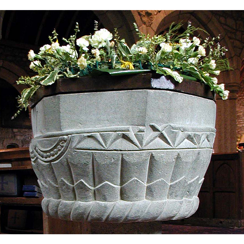 the whole basin has the shape of a scalloped capital