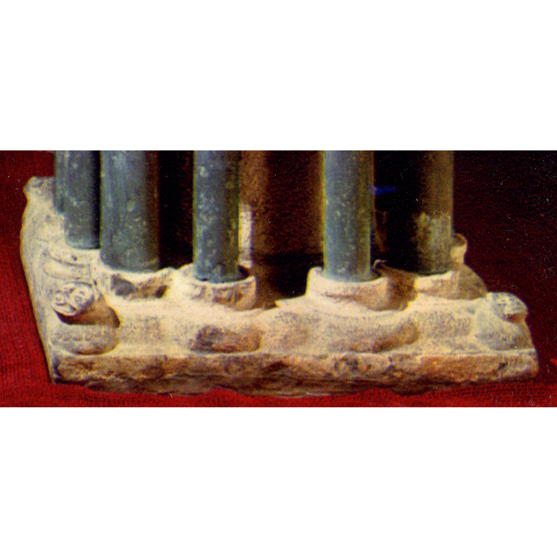 originally one at each angle of the lower base; at least one has disappeared