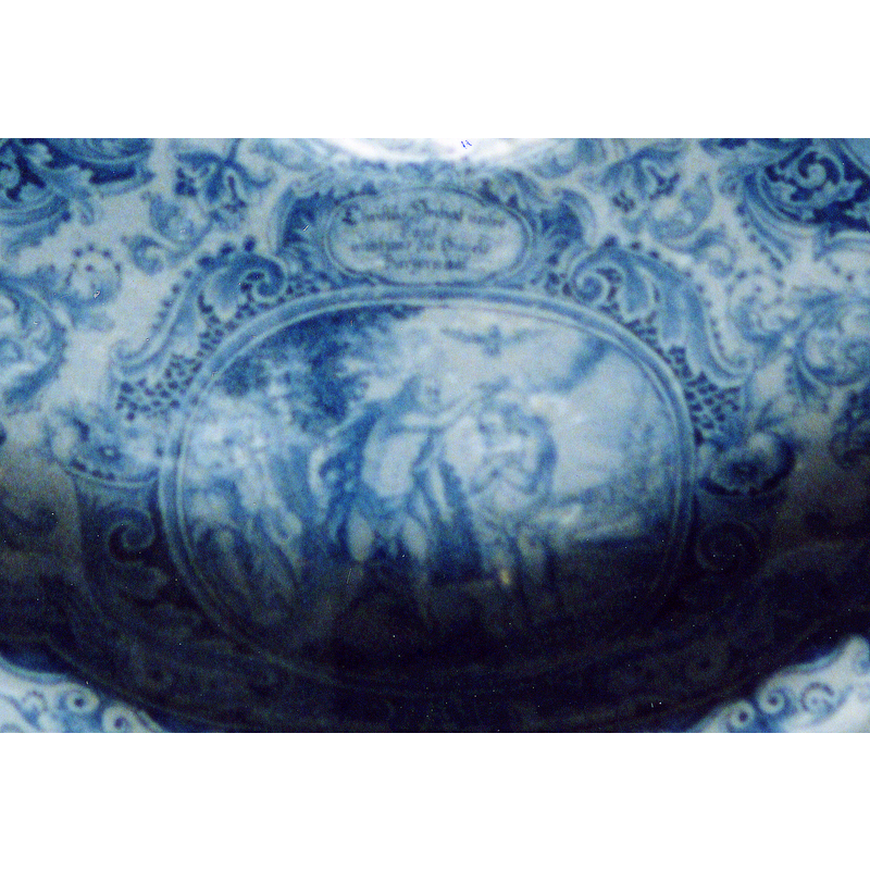 scene on the upper section of the dish