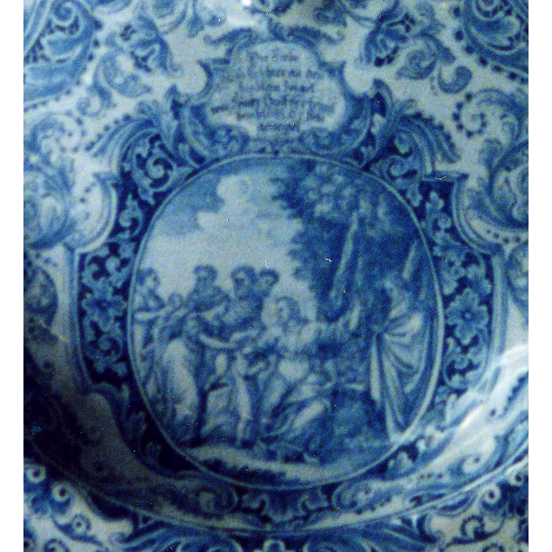 scene on the left section of the dish