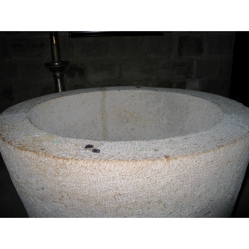 althgough the basin appears totally re-done, evidence of the old cover staples is still visible in the upper rim