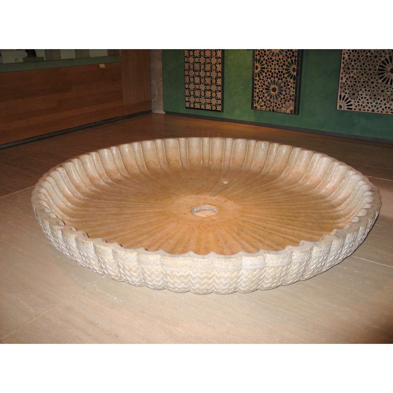 original basin of the 14th century, Nazari period; later used in a palace -- Alhambra museum [inv. R.10221]