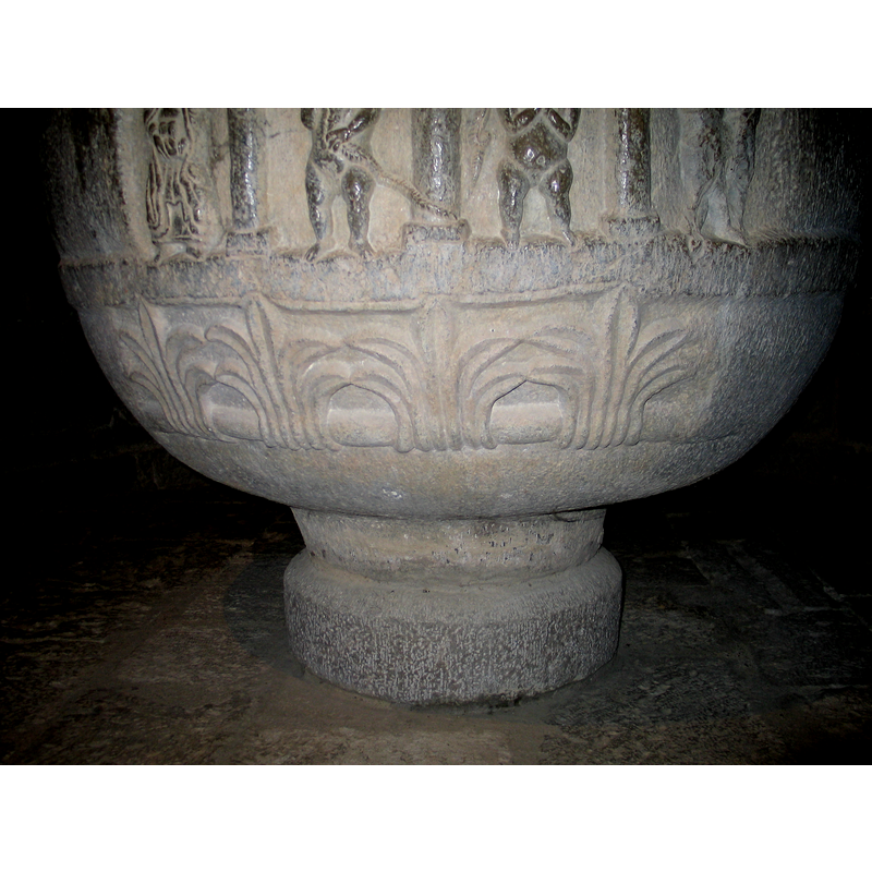 note that the palmettes are only carved on the fron, right under the finished figures