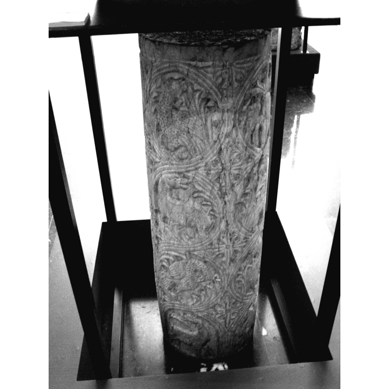 well-executed circle scrolls of foliage that contain chircfly animals inside, and with foliage or floral motifs in the resulting spandrels
