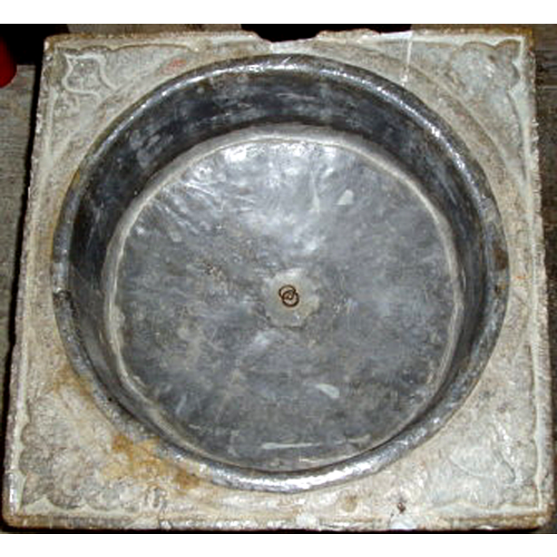 in the corner spandrels of the upper surface