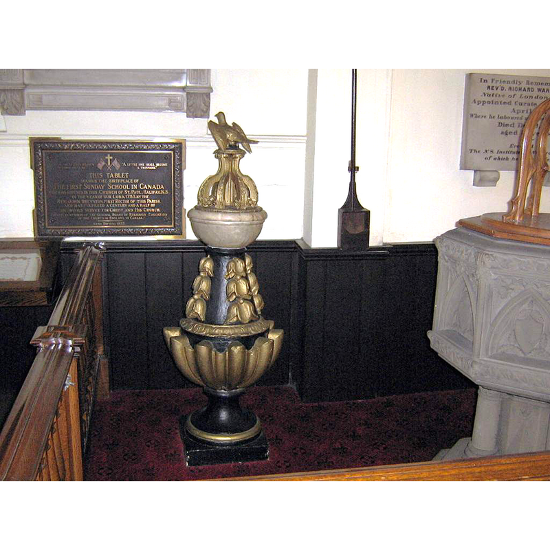 note the stone font on the right side of the image