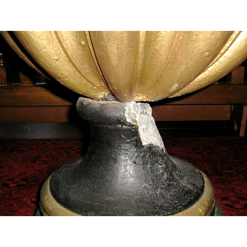 damage showing the composition of the stone base