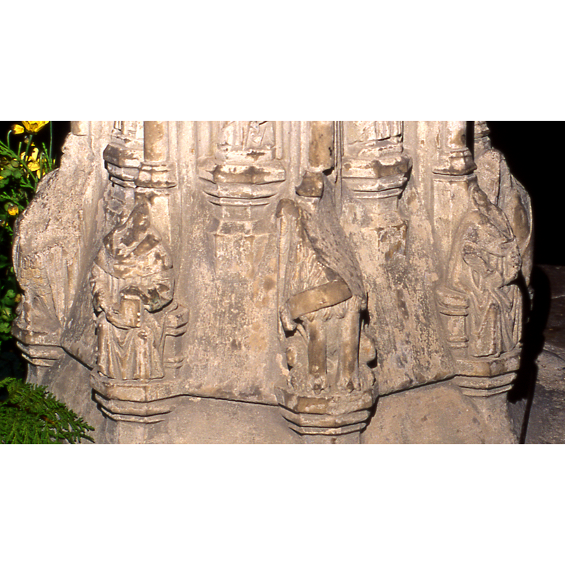 badly damaged or defaced, on the lower volume of the base