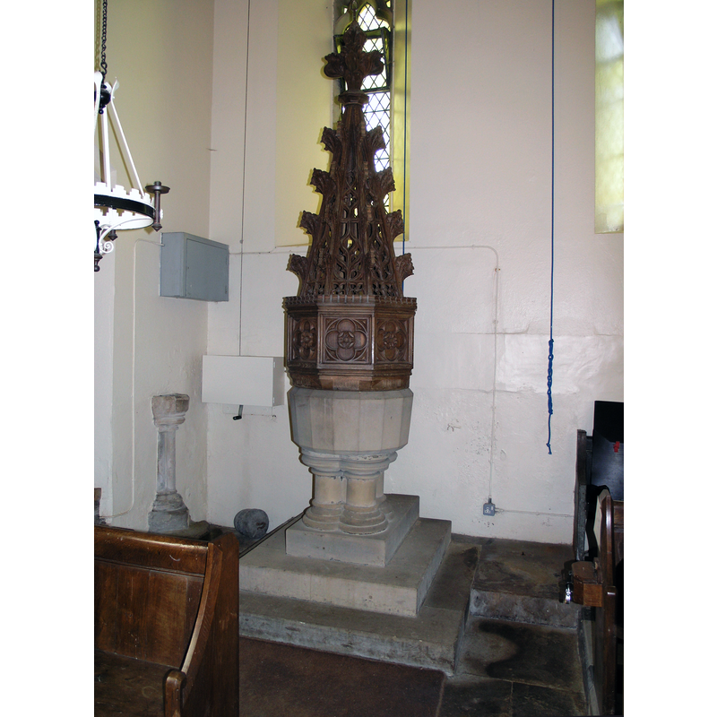 the 13thC(?) stoup can be seen to the left of the mid-19thC replacement font
