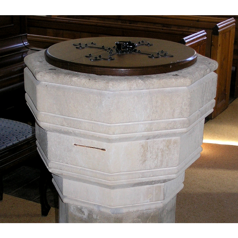 note the freshly-carved appearance of the stone, but the traces of the original surface in the upper rim -- old basin re-carved?