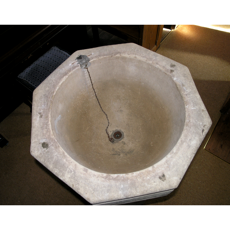 note the polished surface of the interior, as well as the presence of the old metal staples