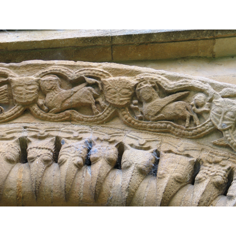 top side: lion of Mark (left) - bull of Luke (right)
