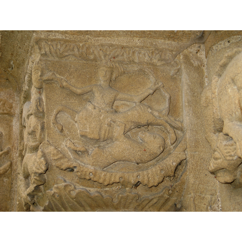 left side capital: centaur and feline fight