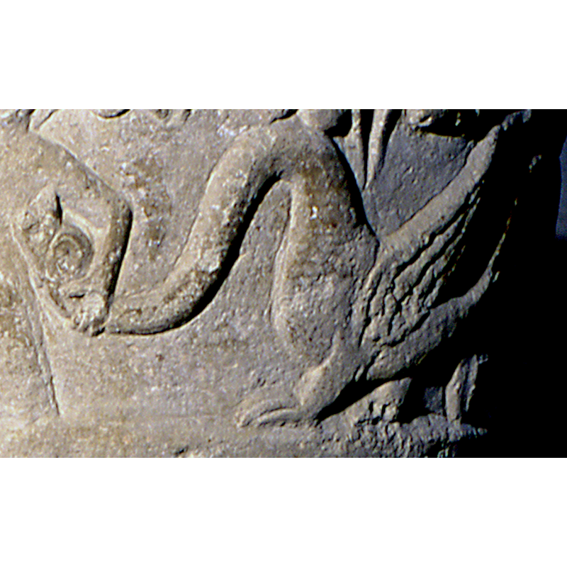 one of the two beasts: to the right of the figure