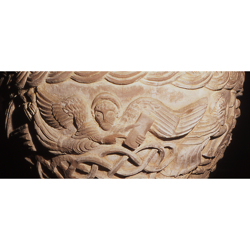 to the right of St. John's eagle, facing right