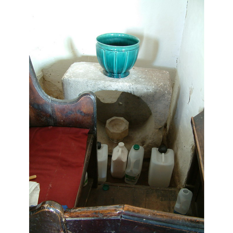 standing on its side, at the back; note also the portable font inside