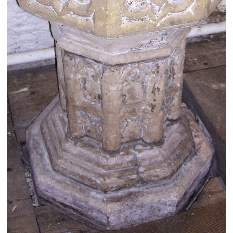 there appear to be very worn figures (?) in the arches