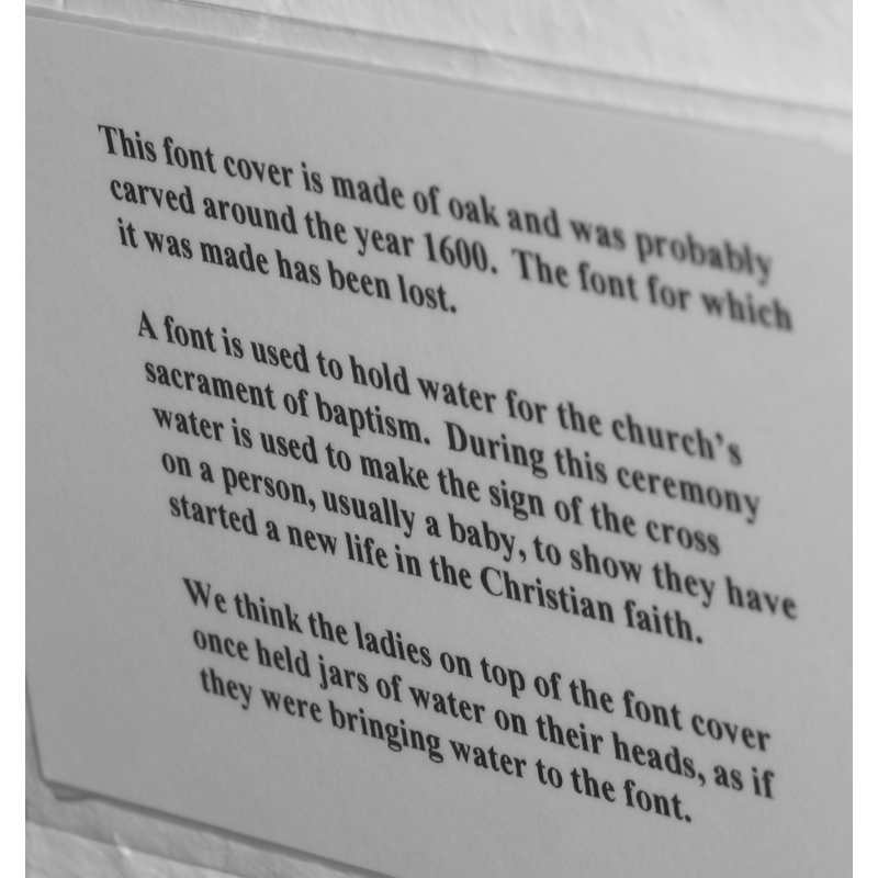 descriptive label accompanying the font cover at the Abbey Museum [cf. Font notes]
