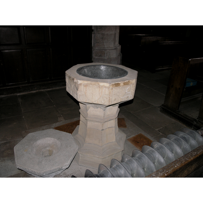 Two of the three fonts: on the right the 16th/17th-century one in use -- to its left, a later basin, now disused