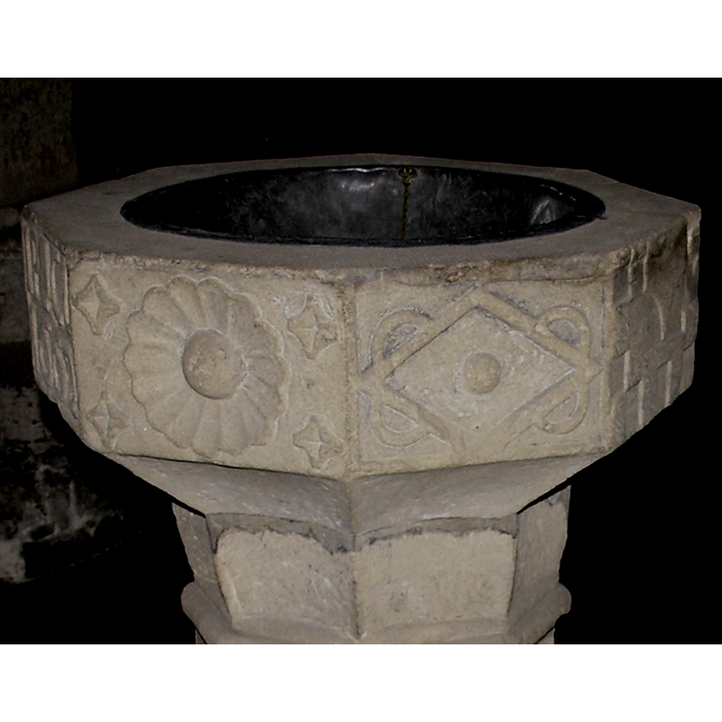 with semi-circles on the outer sides and a ball (?) in its centre