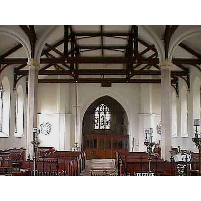 the font visible at the back, just left of the tower arch