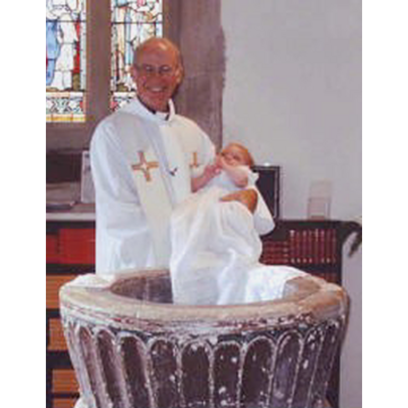 the basin as it appeared before the most recent painting -- a baptism in the old font