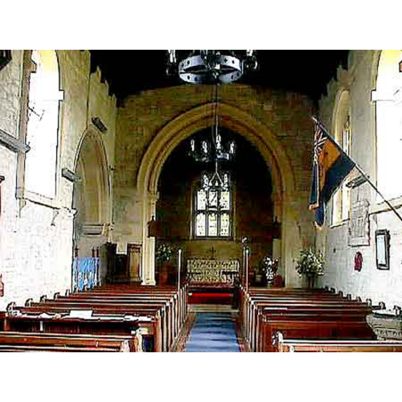 the top of the font partially visible on the right side of the nave, under the flag