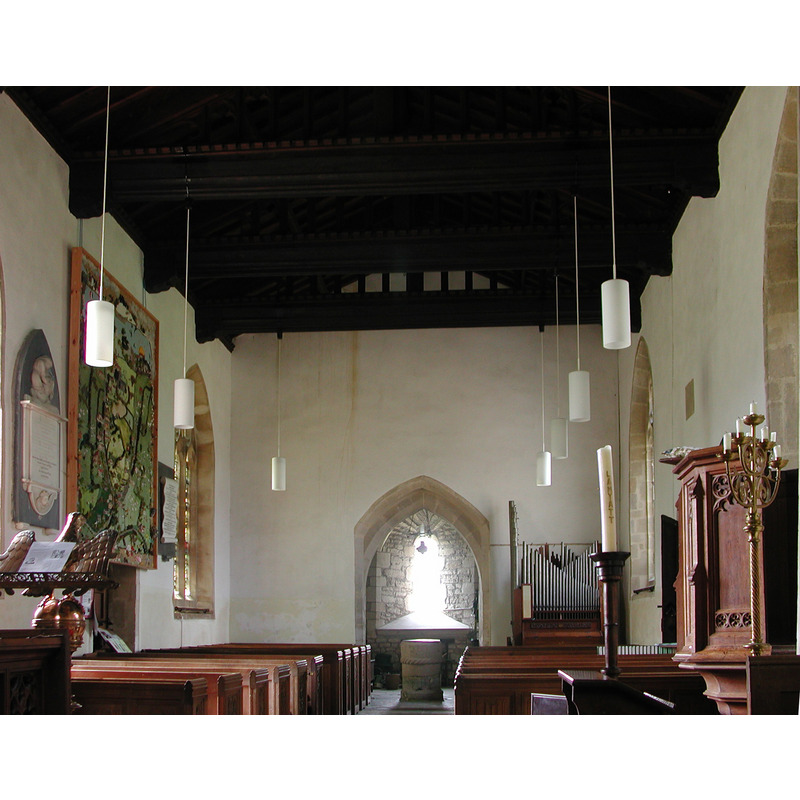 the font visible at the west end of the nave