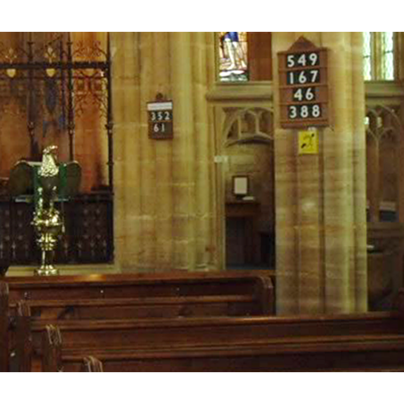 the old repaired font can be partially seen to the right of the pillar in the foreground