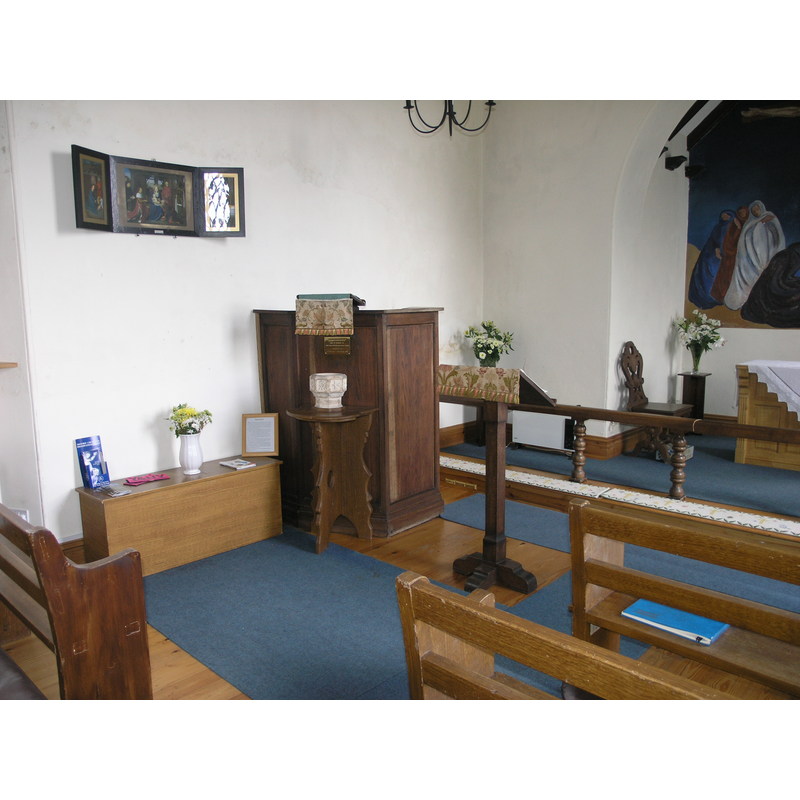 the miniature font on its pedestal