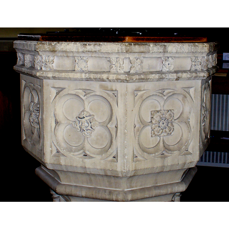 this 19th-century octagonal font was in place inside the church in June 2008 [we have no information on its present whereabouts]