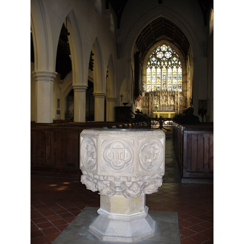 Source caption: "Inside Weybridge Parish Church. St James, on the High Street, was designed by John Loughborough Pearson, the Victorian architect who also designed Truro Cathedral. The [modern] font is at the west end of the nave."