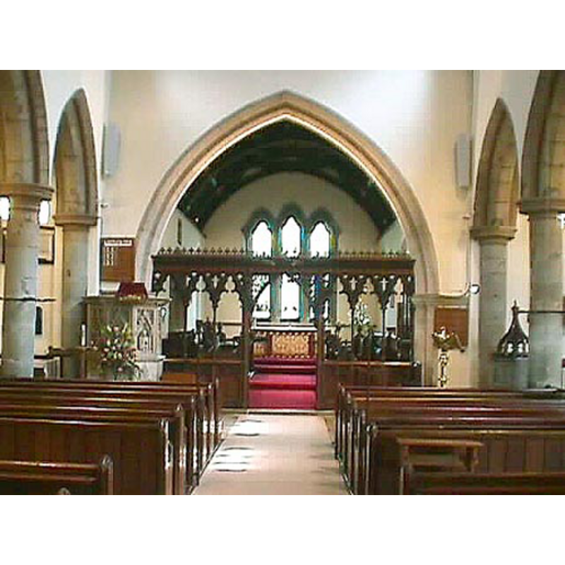 the font and cover are visible under the first arch of the south arcade