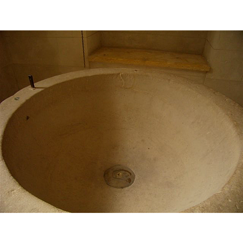 appears to show a re-finishing or restoration of the upper rim