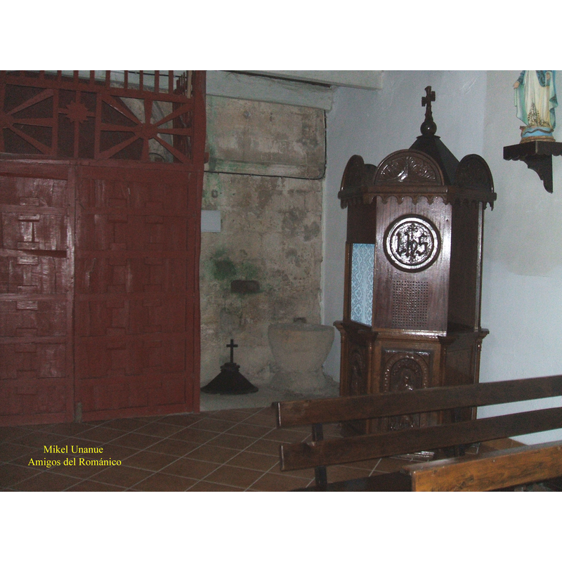 the font and cover between the entranceway and the confessional