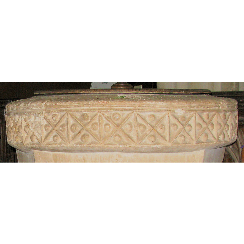 althgough it has been chiselled over, Clarke suggests it was the original motif on the late-Norman font -- [cf. Font notes for Clarke's notes on the modifications made to the original font]