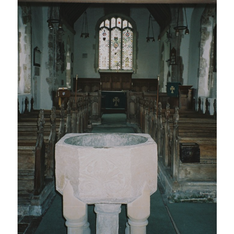 in the foreground the west side of the font; the side where the re-cutting took place
