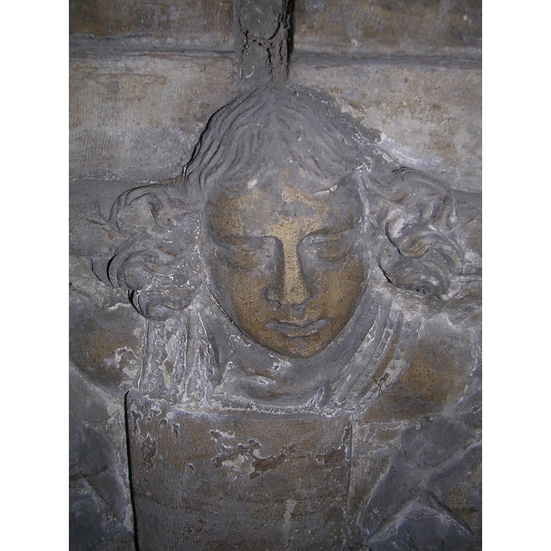 one of the angels holding shields