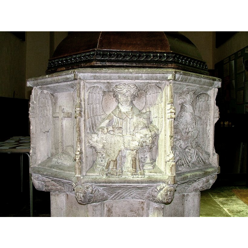 the cross is a recarving of the almost blank espace left by the destruction of the angel-holding-object that occupied this panel previously
