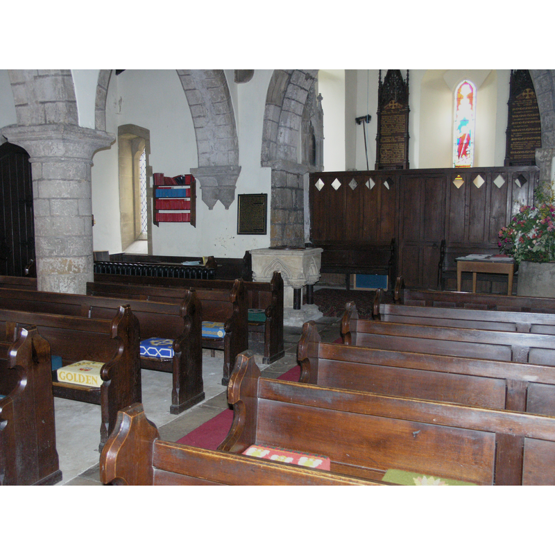 the 19th-century font at the back