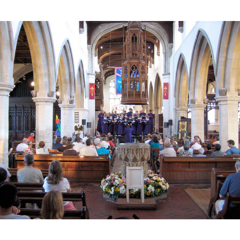 the font and cover in the centre of the nave