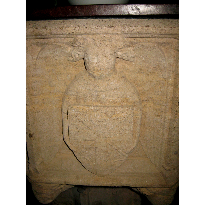 one of four; all the emblems appear to have a cross in them, but they do not appear to be the Instruments of the Passion