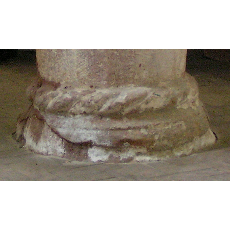 badly damaged, especially below the rope moulding -- [cf. Font notes]