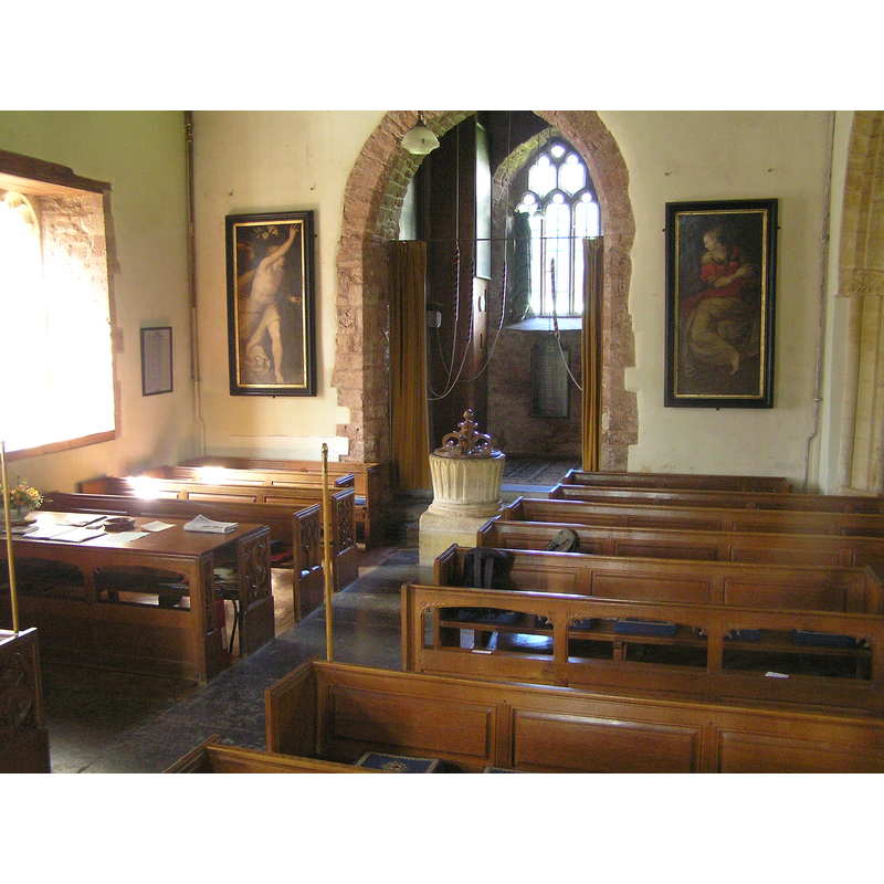 the font and cover just east of the tower arch