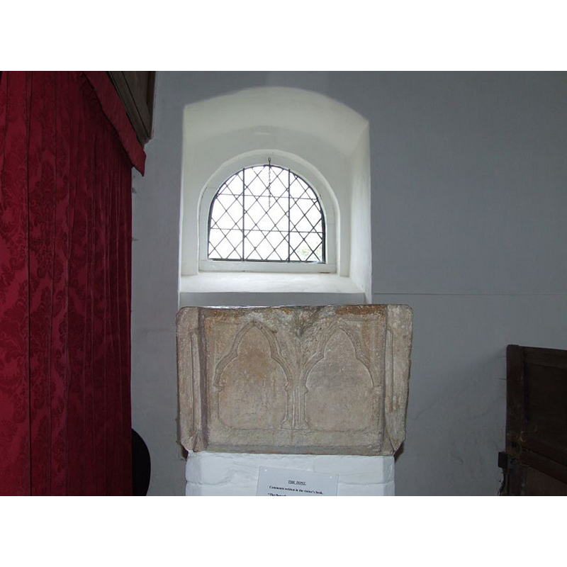 notice the damage around the spandrel of the two arches -- on the south side of the basin [NB: sides named after the cardinal points of the church they face now; orientation is approximate]