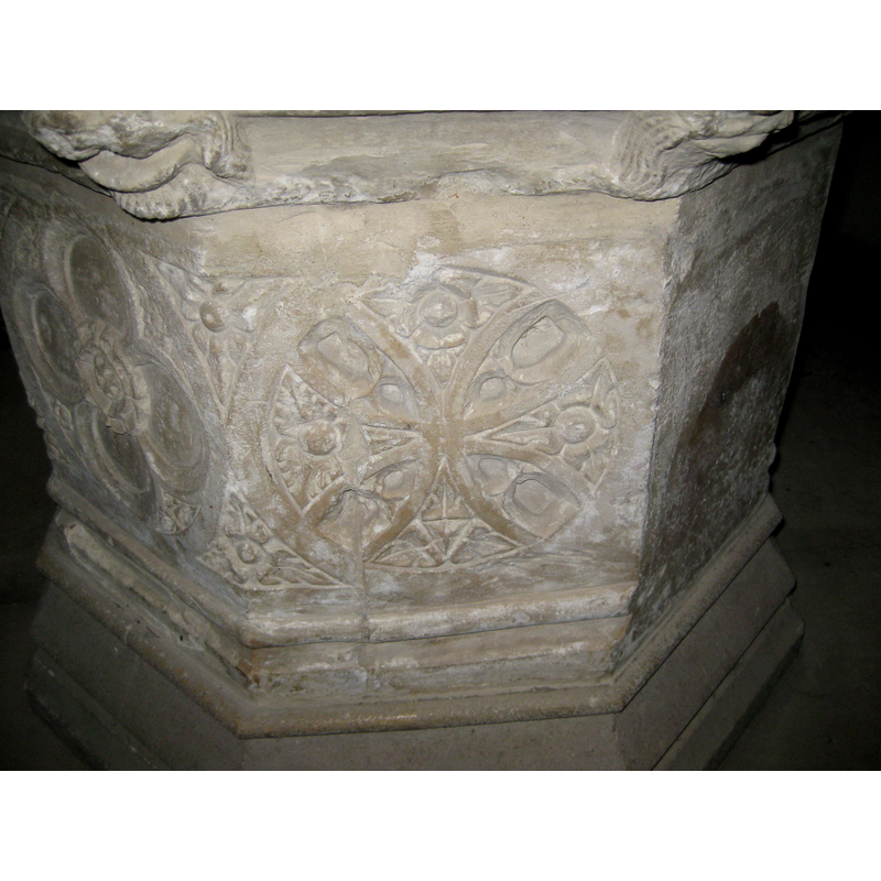 on the right side of the base
