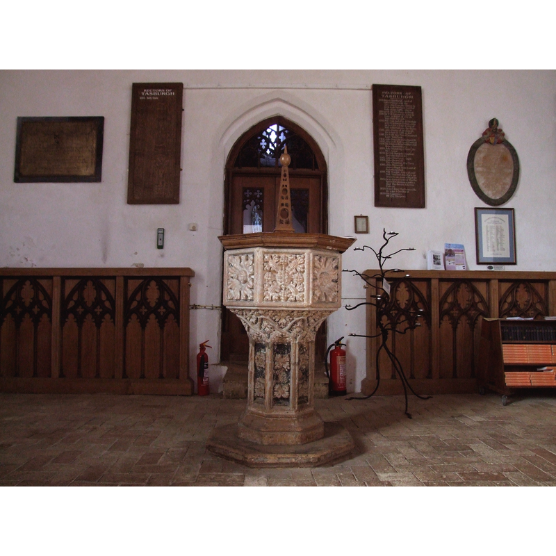 the font from Norwich St. Simon and St. Jude's church photographed inside the church at Tasburgh