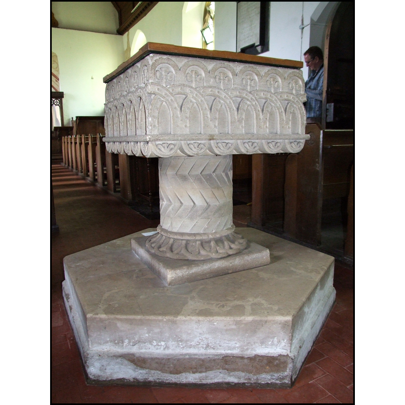 this is the present replica font in Fritton St. Edmund's church