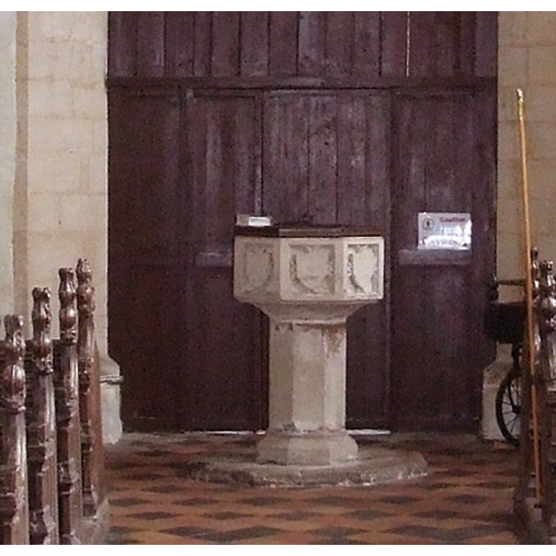 the font and cover in the context of the west entrance
