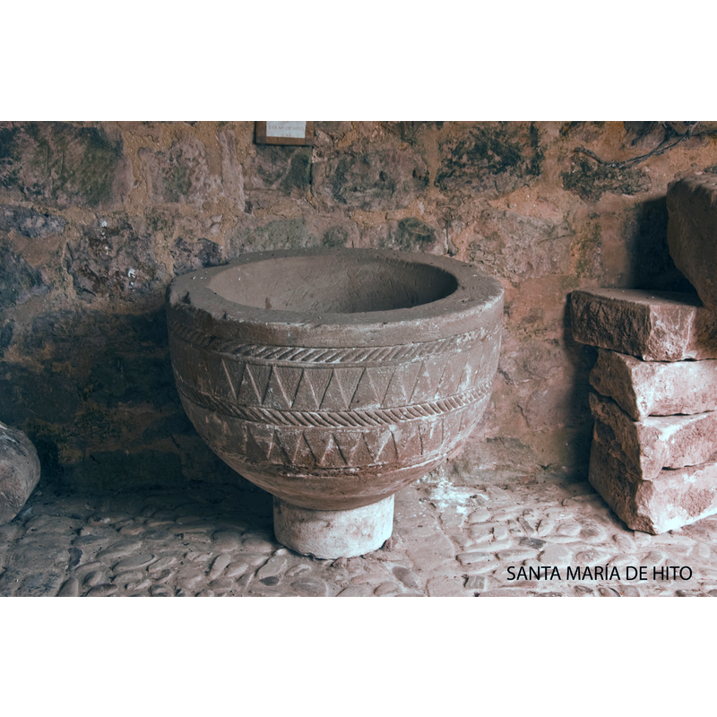the font from Santa Maria de Hito as displayed in the cloister of San Martin de Elines in July 2009